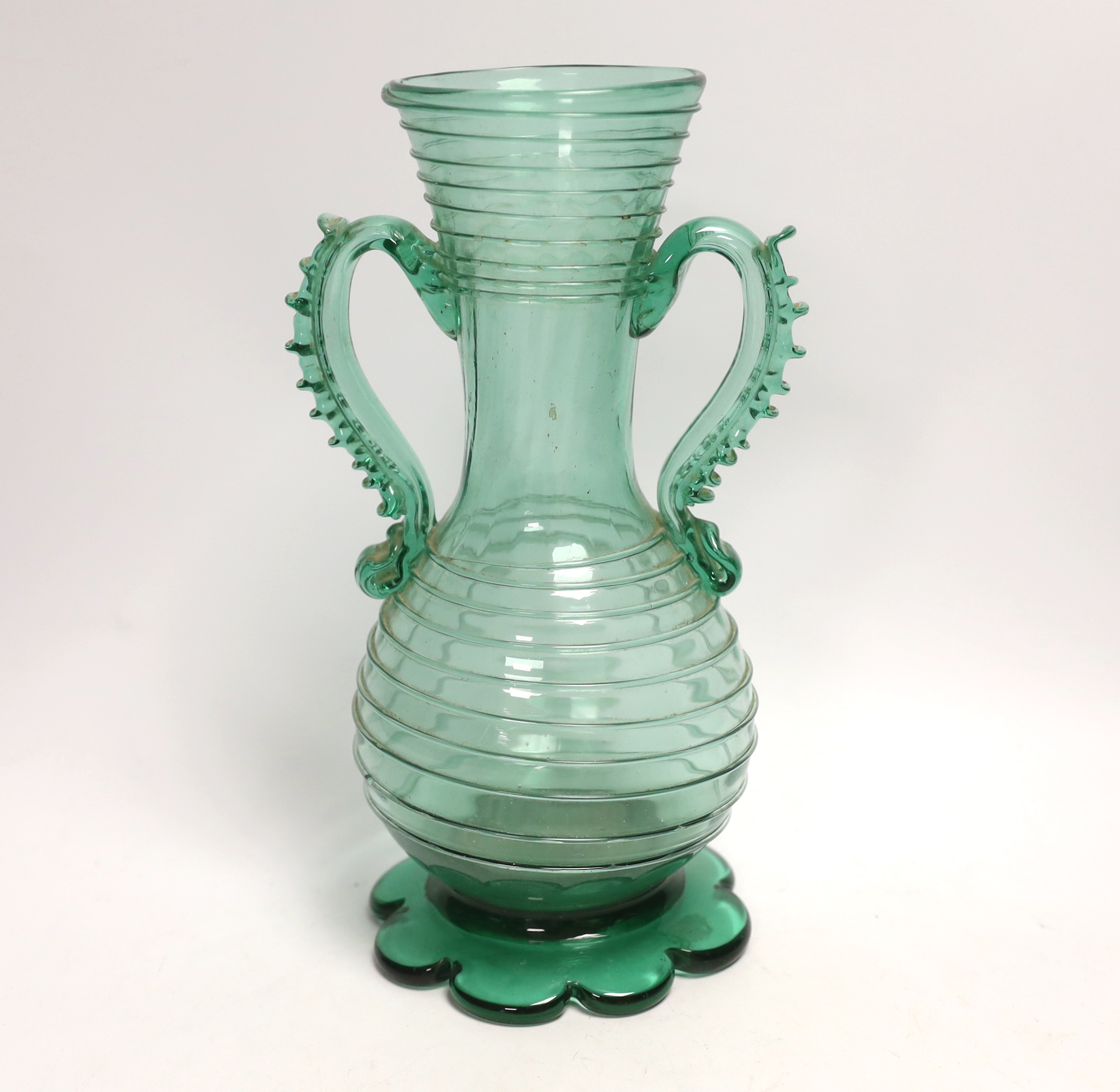 A hand blown green two handled Mallorcan glass vase, 20th century, 26.5cm high